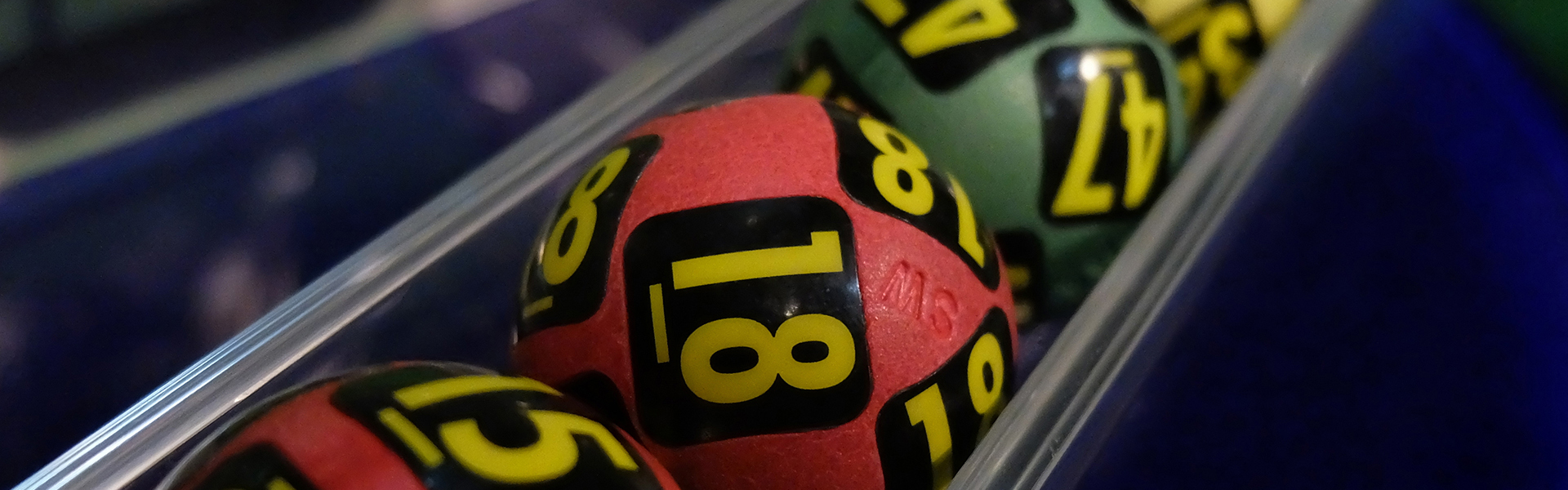 A stock photo showing a series of lottery balls